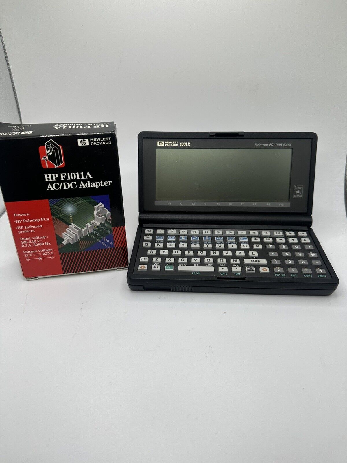 Vintage Hp 100LX 1MB PC Palmtop With OEM Adapter